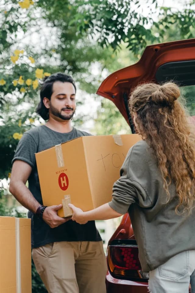 Help someone carry their things